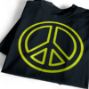 Flock vinyl heat transfer neon peace sign design on black t-shirt